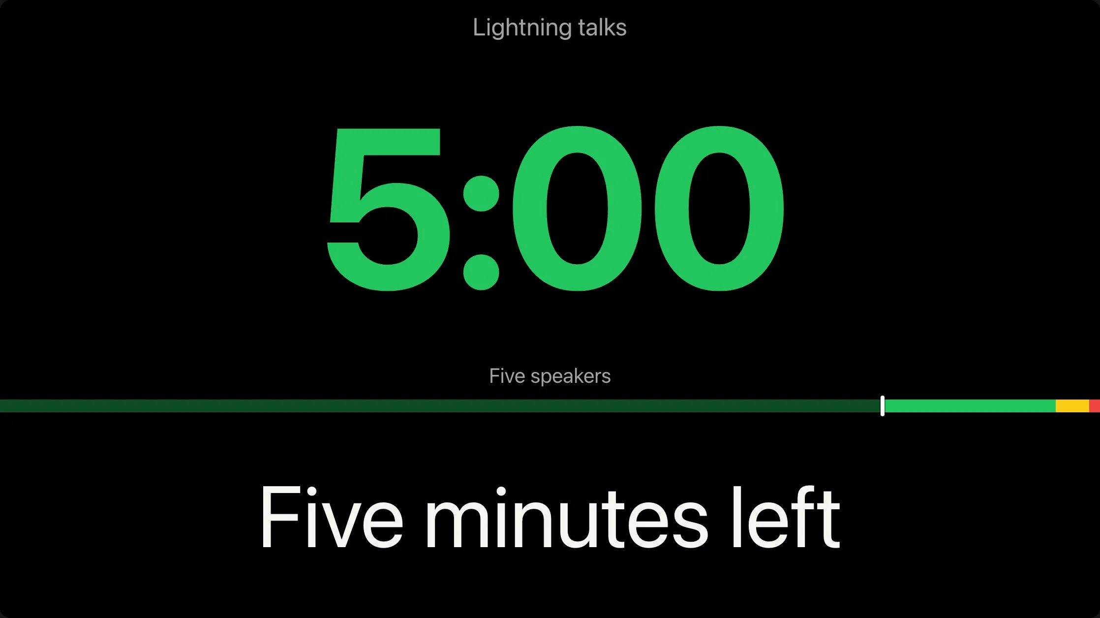 The meetup's screen: the Lightning talks timer at 5:00 in green, Five speakers, the progress bar, and the message Five minutes left.
